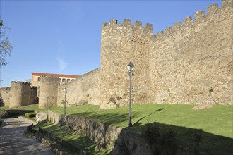 City fortification with battlements built 12th century and defence defence tower, Murallas,