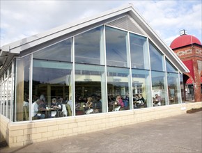 People eating inside Ee-Usk Restaurant, North Pier, Oban, Argyll and Bute, Scotland, United