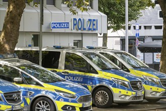 Police station, at Heinrich-Heine-Allee, old town police station, police vehicles, patrol cars, in