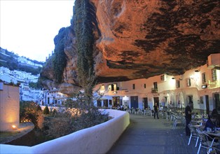 Cafes under rock cave overhang, Setenil de las Bodegas, Cadiz province, Spain, Europe