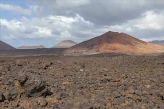 Lava field, volcanic landscape and fire mountains near Los Hervideros, Lanzarote, Canary Islands,