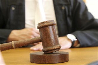 Close-up of a judge's gavel as a symbolic image for a court judgement