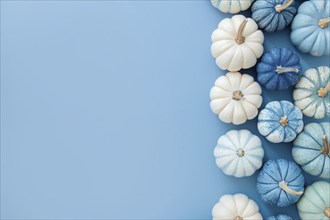 Top view of white and blue pumpkins on pastel blue background with copy space. Generative Ai, AI