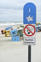 Smoke-free beach sign on the beach of Langeoog, East Frisian Islands, Lower Saxony, Germany, Europe