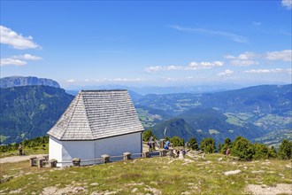 View at the dolomites alps with The Holy Cross Chapel on Rasciesa mountains, Ortisei, Val Gardena,