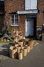 Wicker baskets outside craft shop, Orford, Suffolk, England, United Kingdom, Europe