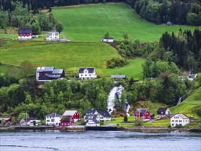 Mountains and Fiord over Norwegian Village in Olden, Innvikfjorden, Norway, Europe