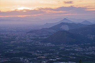 View of the densely populated Neapolitan region and the mountains near Caserta in the hazy evening