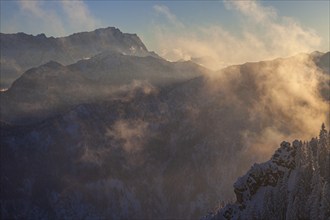 Mountain peak in winter, evening light, snow, view from the Laber to the Zugspitze, Ammergau Alps,