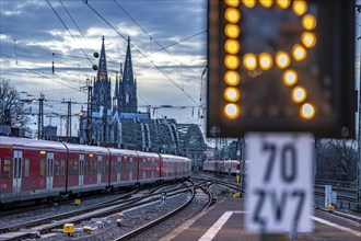 Local train on the line in front of Cologne Central Station, Hohenzollern Bridge, Cologne