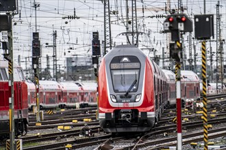 Regional express train entering Frankfurt am Main main station, track system, signals, overhead