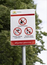 Prohibition sign at the historic Binnenhof, seat of the Dutch government, begging, smoking weed and