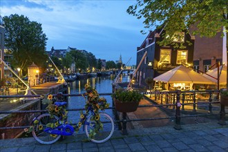 Sint Antoniesluis, on the Oudeschans canal, canal cruise boat, café, De Sluyswacht, Amsterdam,