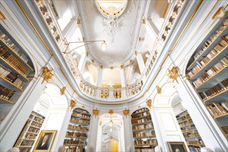 Baroque library with magnificent decorations and high bookshelves, Weimar, Germany, Europe