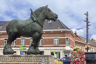 Prins, bronze statue of Brabant draft, draught horse by Belgian sculptor Koenraad Tinel at market