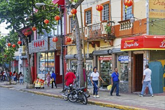 Chinese shops and restaurants in Chinatown, Barrio Chino along the Avenida Juan Pablo Duarte in the