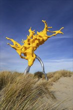 Sculpture Olnetop by Belgian artist Nick Ervinck in the dunes at seaside resort Westende,