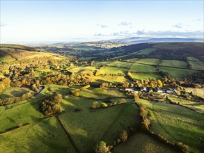 Farms over Trecastle from a drone at sunset, Brecon Beacons National Park, Powys, Wales, England,