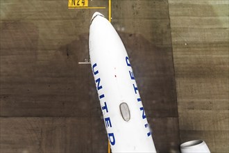 A United Airlines Boeing 777 aircraft at Chek Lap Kok Airport (HKG) in Hong Kong, China, Asia