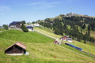 View of Mount Rigi with Rigi railway with Alps mountains in Rigi, Switzerland, Europe