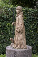 Sculpture of Benedict of Nursia in the monastery garden of the former Benedictine abbey of