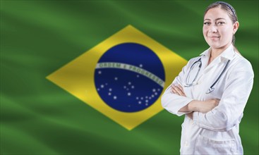 Female doctor on Brazil flag. Doctor with crossed arms on Brazilian flag. Brazilian Health and Care