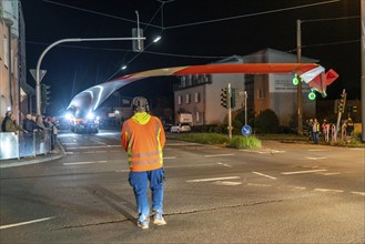 Transport of a 68 metre long, 22 tonne blade of a wind turbine, here in Schwelm, with a