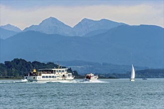 Excursion boat, passenger ship MS Josef, speedboat of the water rescue service overtakes in fast