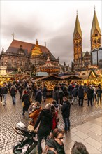 Christmas market at the historic town hall of the Hanseatic city of Bremen, market square in the