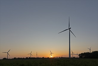 Sunset, wind turbines, silhouettes, Melbeck, Samtgemeinde Ilmenau, Lower Saxony, Germany, Europe