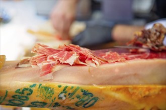 Famous street market near Barcelona Cathedral in Las Ramblas, Jamon Serrano preparation stand