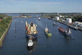 Cargo ships waiting in front of the lock, Kiel Canal, Holtenau, Kiel, Schleswig-Holstein, Germany,