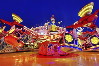 The illuminated carousel Circus Circus in the evening, Cranger Kirmes, Herne, Ruhr area, North