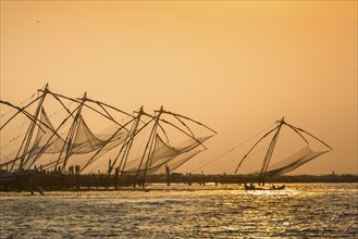 Chinese fishing nets, sunset, Arabian Sea coast, Fort Cochin, Kochi, Kerala, South India, India,