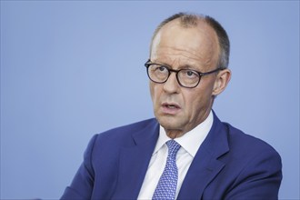 Friedrich Merz, CDU party chairman, at the Federal Press Conference on the consequences of Solingen