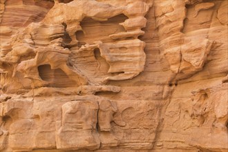 Natural texture of red rocks. Colored canyon, Egypt, desert, the Sinai Peninsula, Nuweiba, Dahab,