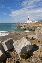 Red and white lighthouse on the coast at Portland Bill, Isle of Portland, Dorset, England, United