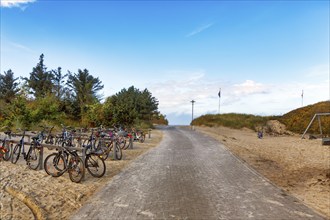 Beach access with parking for bicycles, autumn weather, Föhr Island, North Frisia, North Sea,