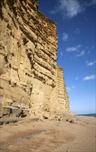 Sandstone cliffs and beach West Bay, Bridport, Dorset, England, UK