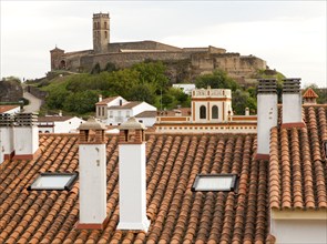 Tower and Moorish mosque above the village of Almonaster La Real, Sierra de Aracena, Huelva