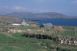 Houses, stone walls, view to the mainland, Dursey Island, Beara Peninsula, County Cork, Republic of