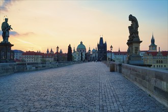 Charles Bridge with Old Town Bridge Tower, morning atmosphere, Prague, Czech Republic, Europe