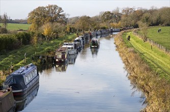 Narrowboats on Kennet and Avon canal, from Ladies bridge, Wilcot, near Woodborough, Wiltshire,