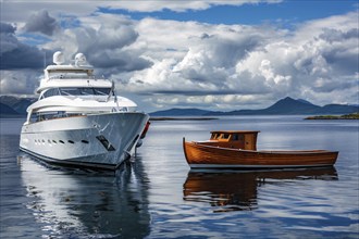 Concept for economic and social inequality showing small poor wooden fishing boat and luxury yacht