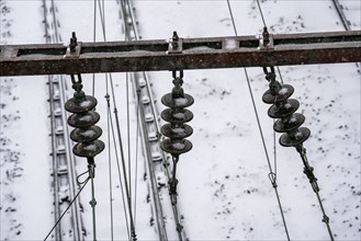 Onset of winter with lots of fresh snow and temperatures below -5 degrees during the day, railway