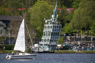 Lake Baldeney in Essen, reservoir of the Ruhr, sailing boat in front of the regatta tower, Essen,