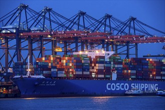 Container ship of the shipping company Cosco Shipping, CSCL SATURN, being loaded and unloaded,