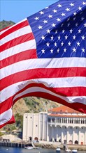 American star spangled flag waving in California. A large American flag is flying high above