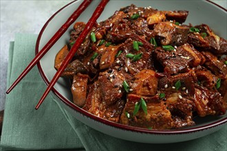 Bulgogi, with mushrooms, with sesame seeds and green onions, Korean cuisine, homemade, no people