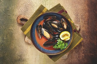 Fra Diavolo mussels, mussels in tomato sauce, Italian dish, on the table, top view, homemade, no